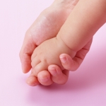 baby hand gentle touch